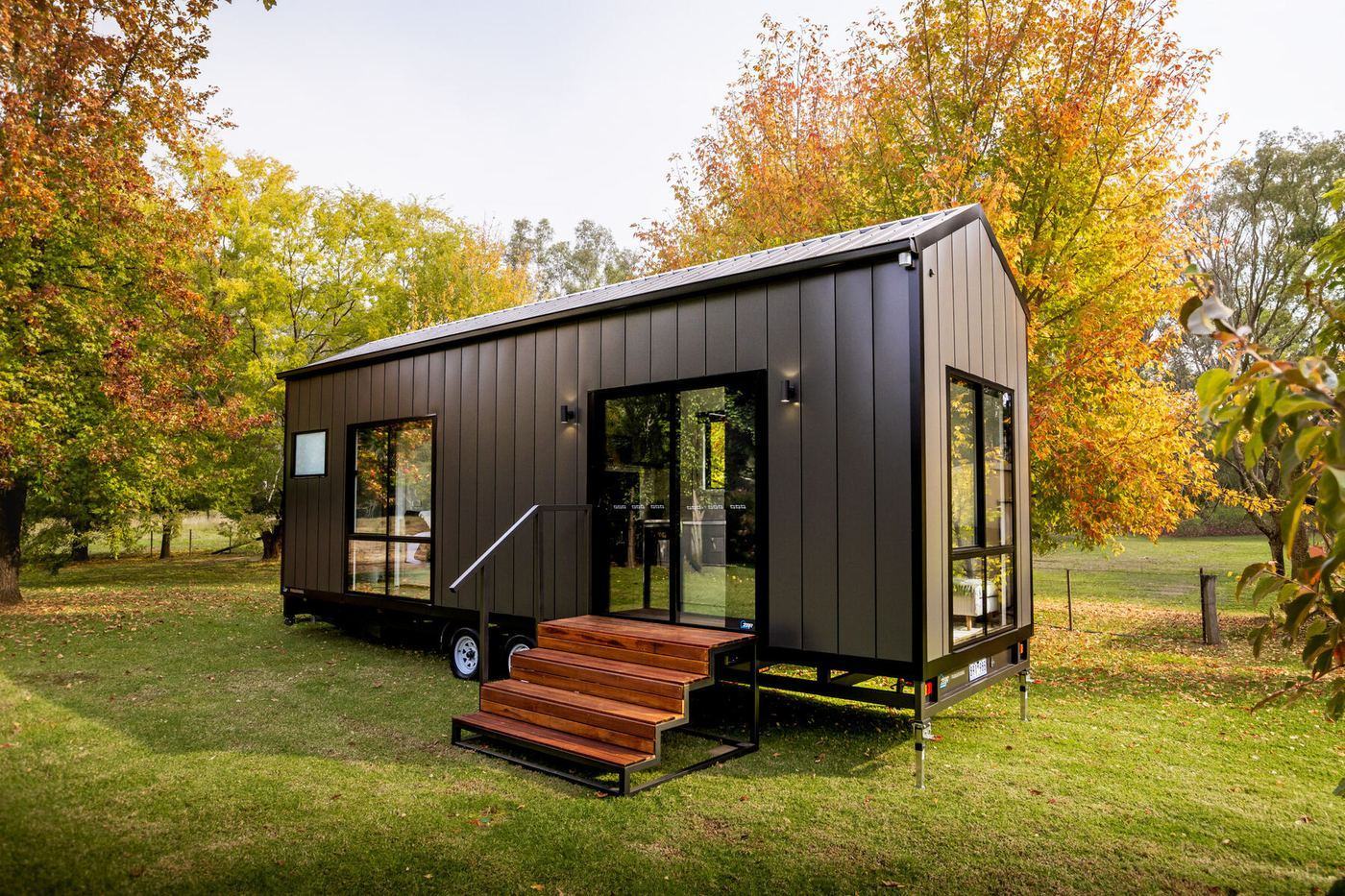ZBR Tiny Homes exterior view among autumn trees